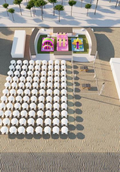Spiaggia con ombrelloni, giochi gonfiabili e strutture.